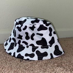Cow print bucket hat, worn once.